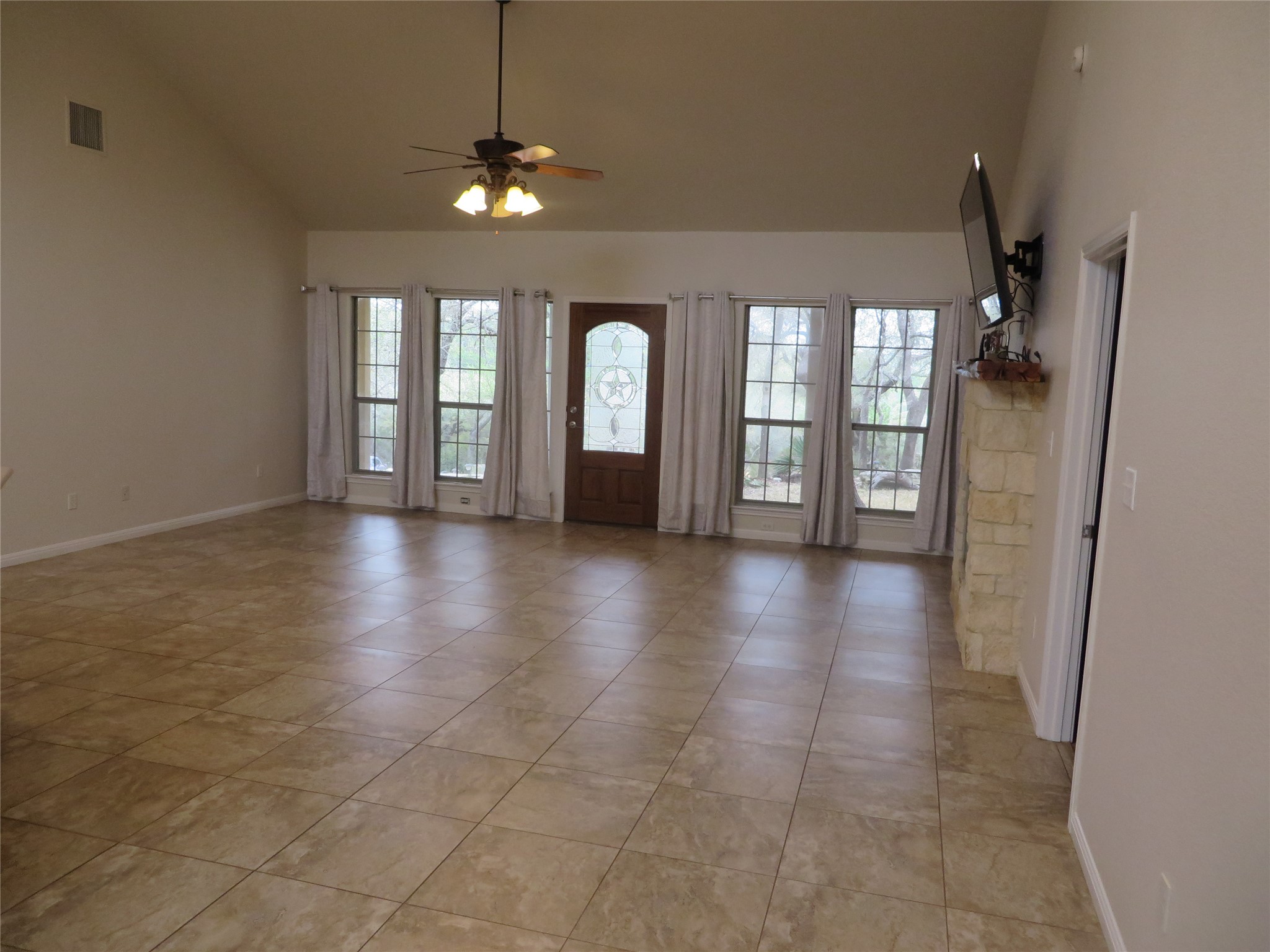 1761 Cottonwood Road Fischer, TX 78623 - Photo 21 of 29 a view of a room with window and wooden floor