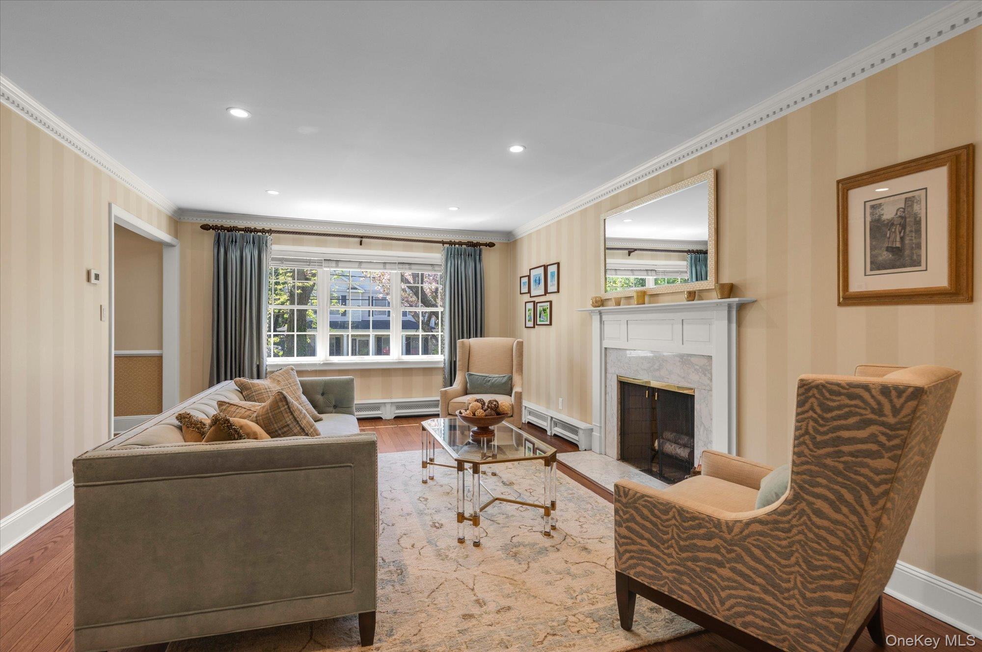 6 Maple Avenue Locust Valley, NY 11560 - Photo 4 of 21 a living room with furniture and a fireplace