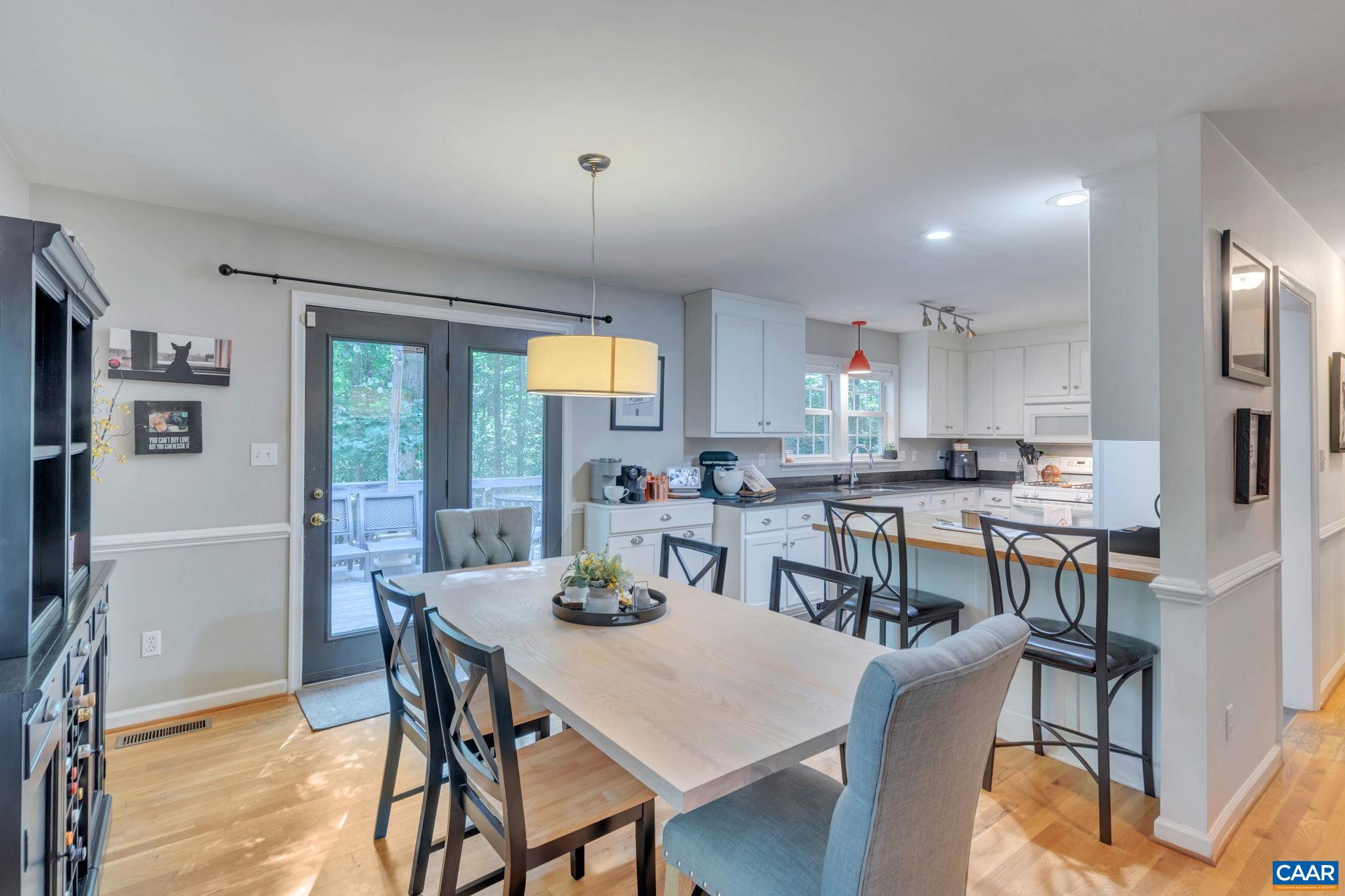 9 Colonial Road Palmyra, VA 22963 - Photo 11 of 49 a view of a dining room with furniture and a large window