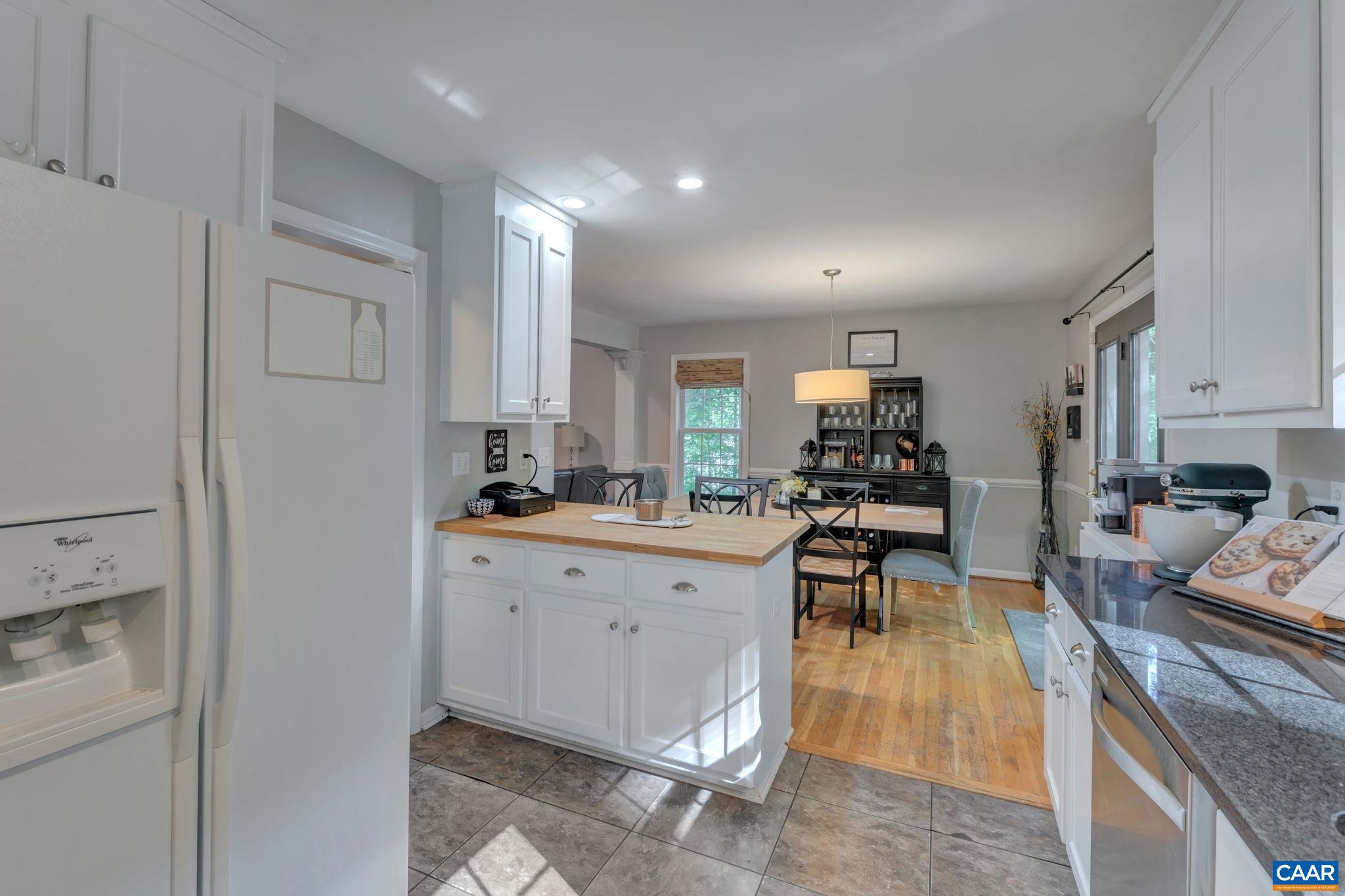 9 Colonial Road Palmyra, VA 22963 - Photo 14 of 49 a large kitchen with a table and chairs in it