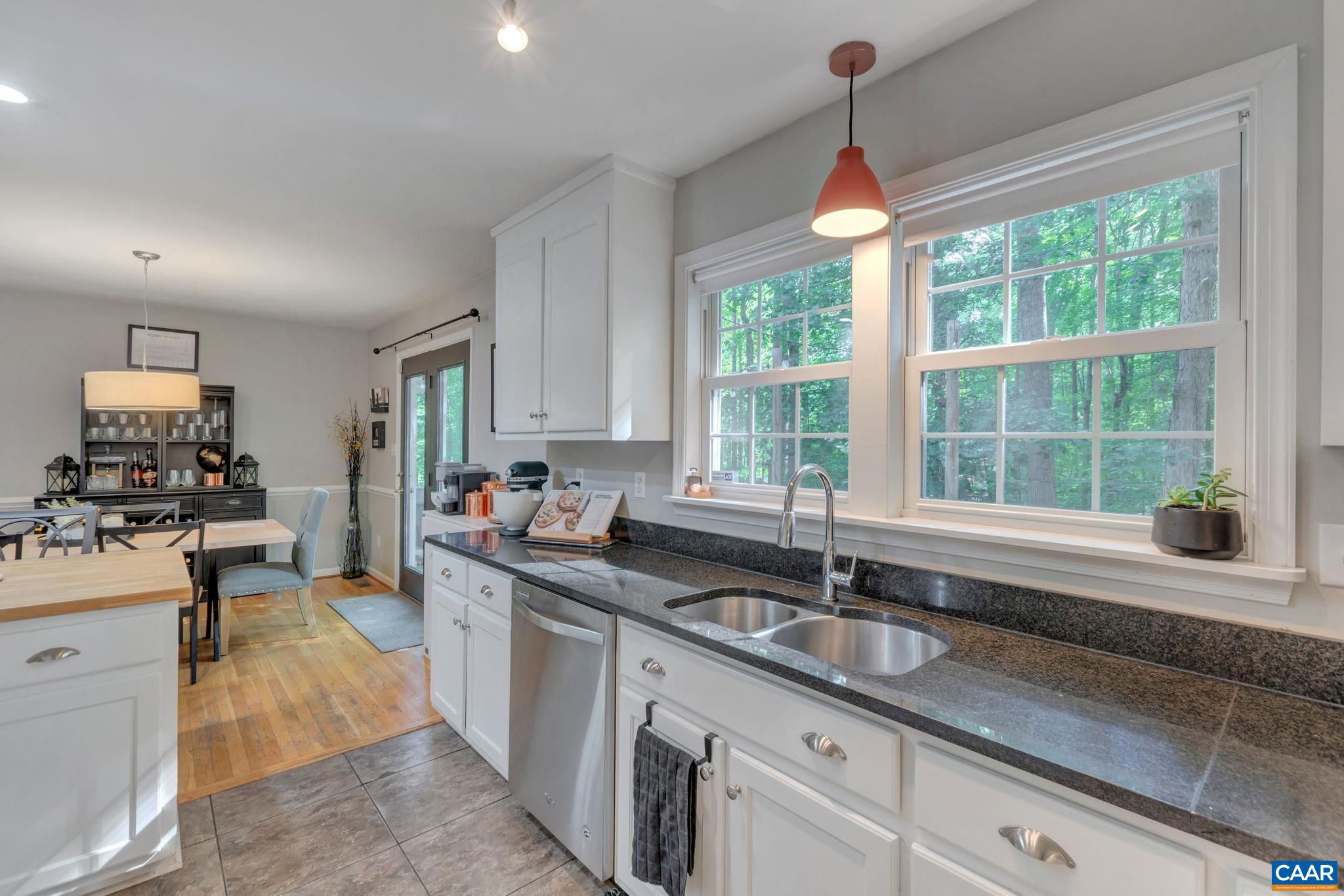 9 Colonial Road Palmyra, VA 22963 - Photo 15 of 49 a kitchen with sink a window and cabinets