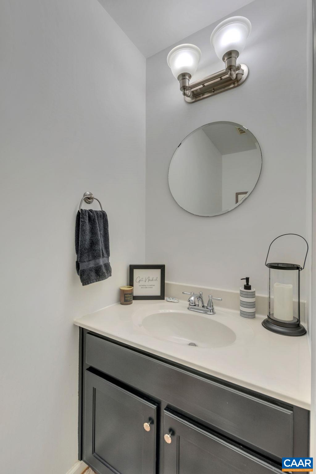 9 Colonial Road Palmyra, VA 22963 - Photo 18 of 49 a bathroom with a sink and a mirror