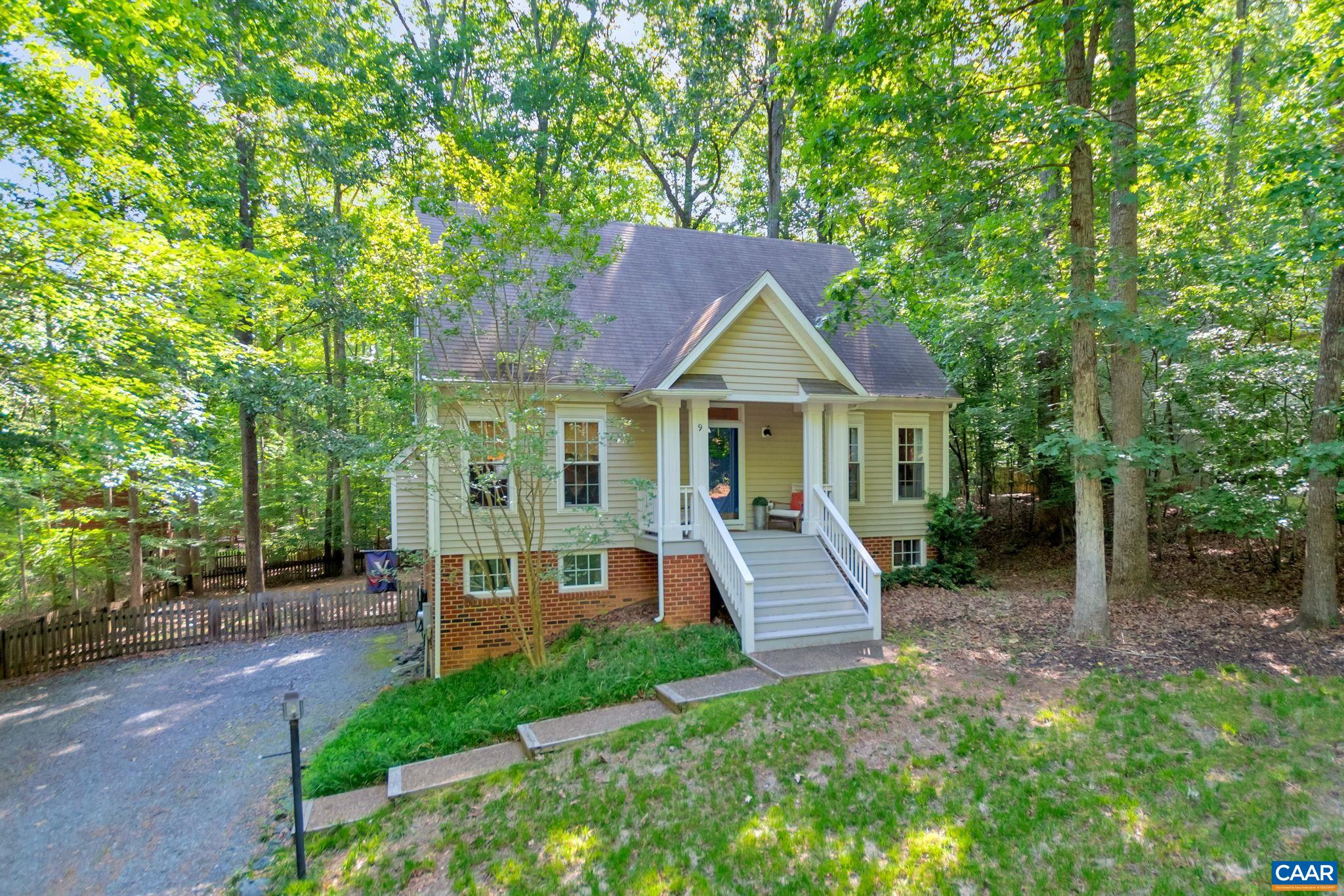 9 Colonial Road Palmyra, VA 22963 - Photo 3 of 49 a front view of a house with a yard