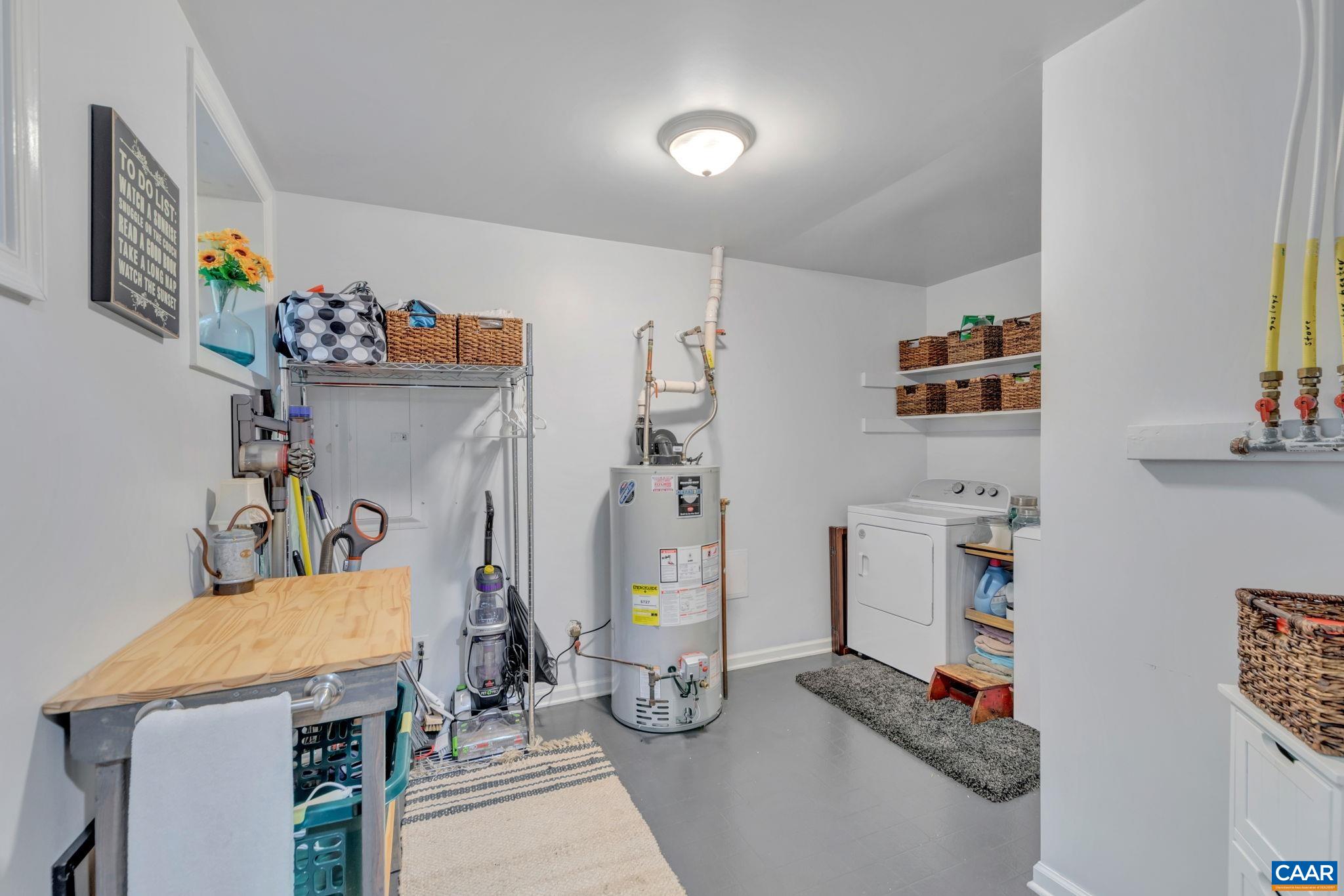 9 Colonial Road Palmyra, VA 22963 - Photo 39 of 49 a room with gym equipment and a table