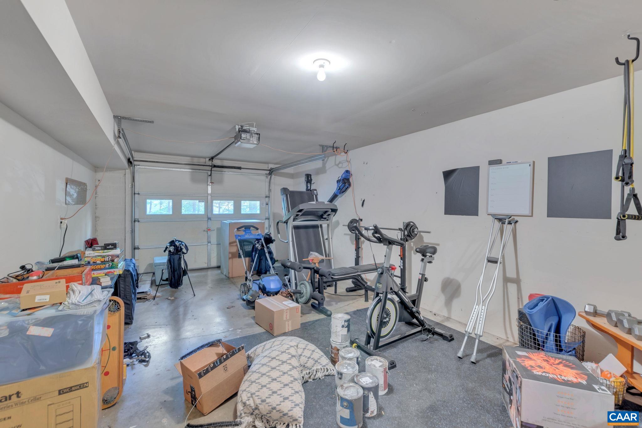 9 Colonial Road Palmyra, VA 22963 - Photo 40 of 49 a room with gym equipment and a table