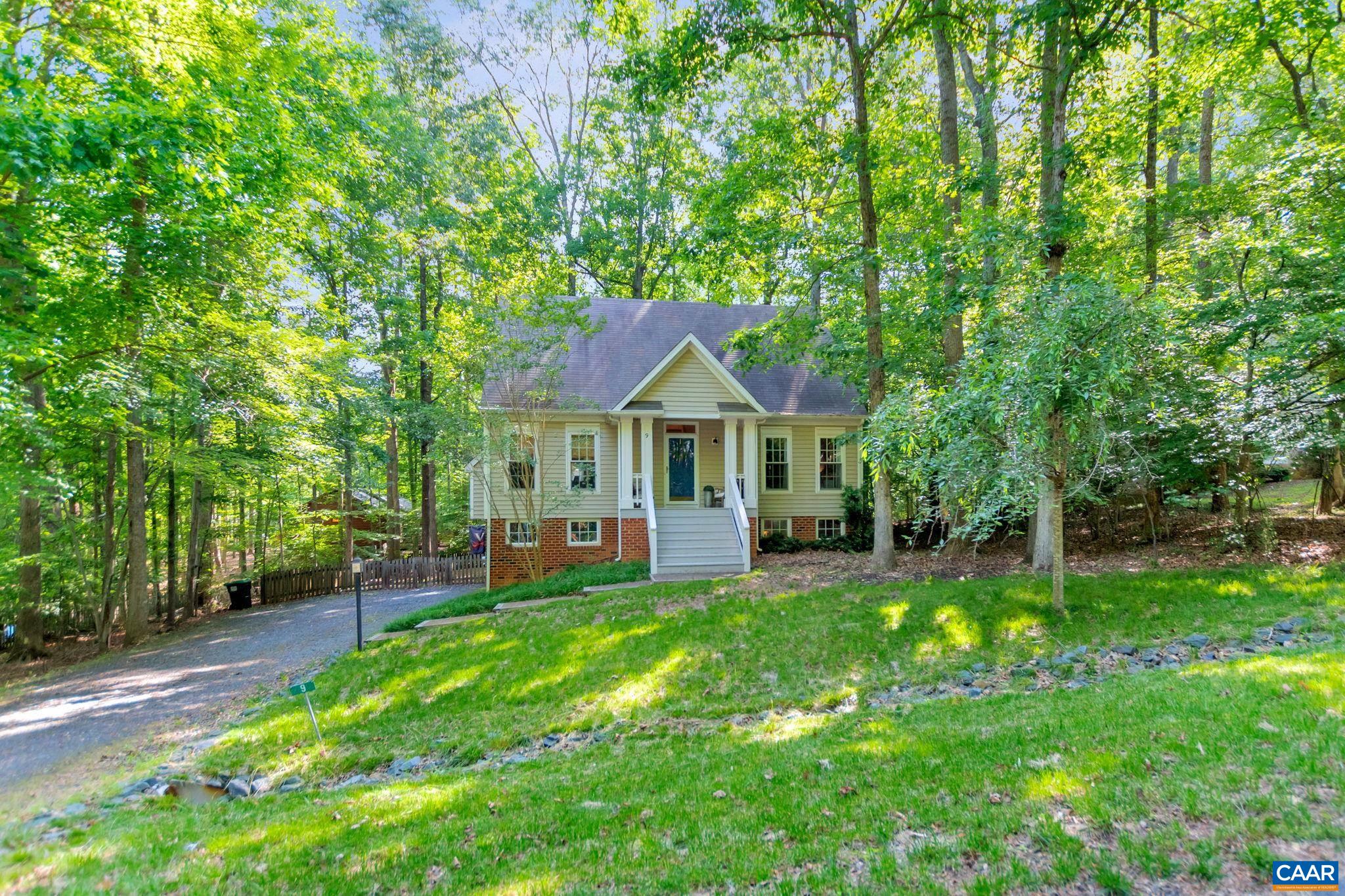 9 Colonial Road Palmyra, VA 22963 - Photo 4 of 49 a aerial view of a house with swimming pool next to a big yard