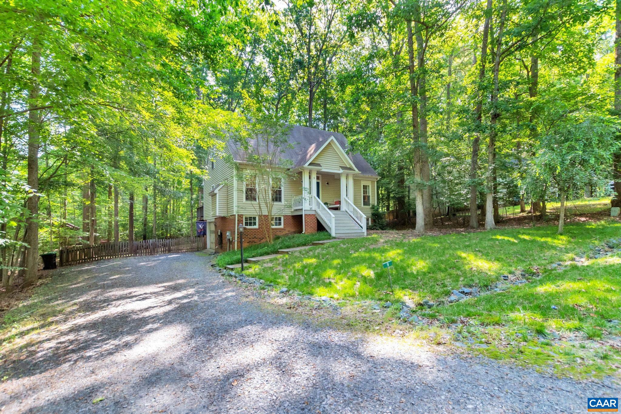 9 Colonial Road Palmyra, VA 22963 - Photo 49 of 49 a front view of a house with garden