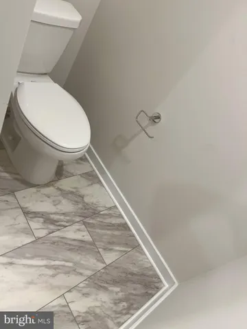 a bathroom with a toilet