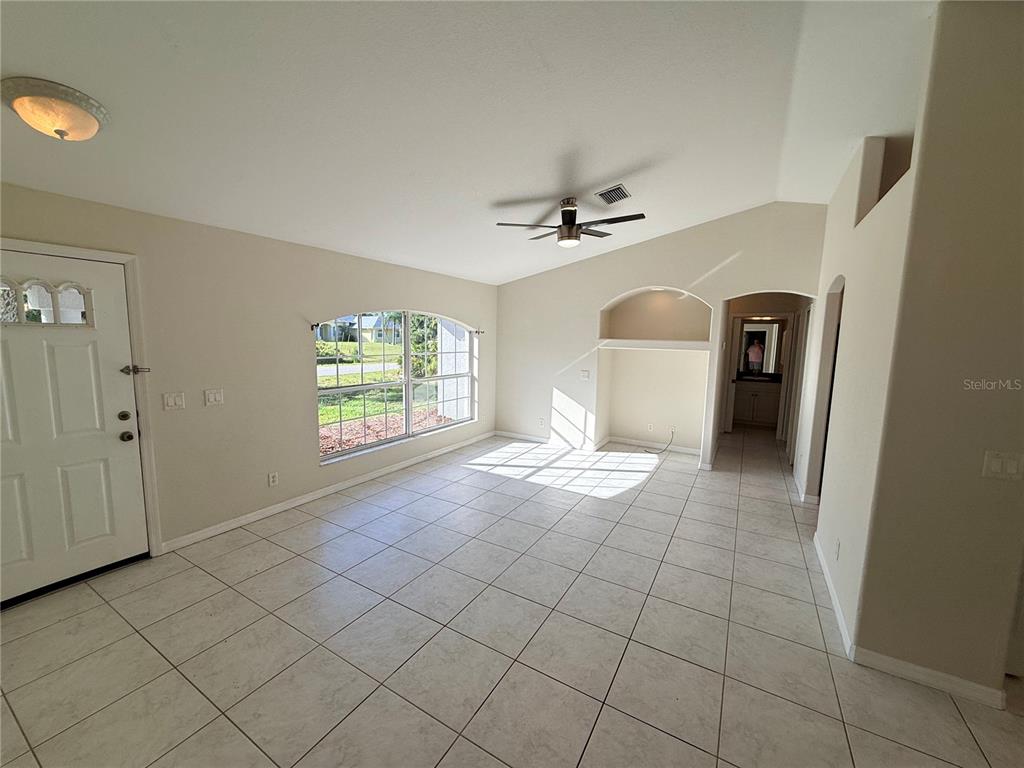 4185 Amari Road North Port, FL 34291 - Photo 4 of 14 a view of an empty room with a window