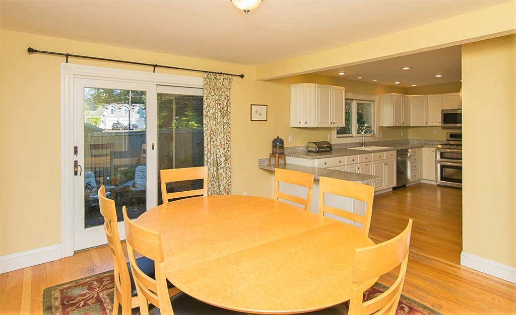 8 Framar Road Wellesley, MA 02481 - Photo 13 of 30 a view of a dining room with furniture and wooden floor