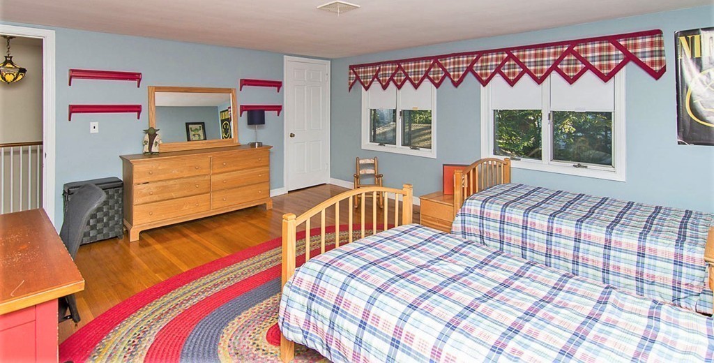 8 Framar Road Wellesley, MA 02481 - Photo 23 of 30 a bedroom with furniture and a large window