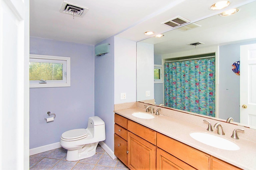8 Framar Road Wellesley, MA 02481 - Photo 24 of 30 a bathroom with a sink toilet and shower