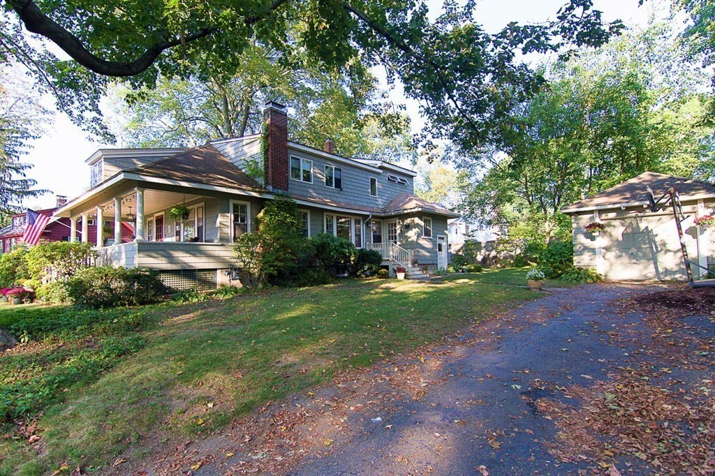 8 Framar Road Wellesley, MA 02481 - Photo 30 of 30 a front view of a house with garden
