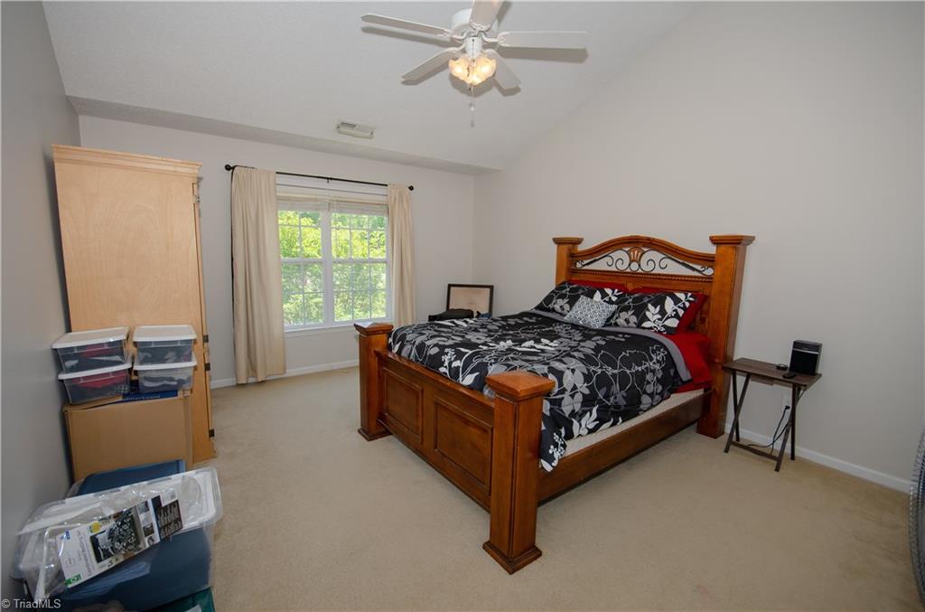 300 Falcon Road Gibsonville, NC 27249 - Photo 16 of 29 Large Master Bedroom with vaulted ceiling