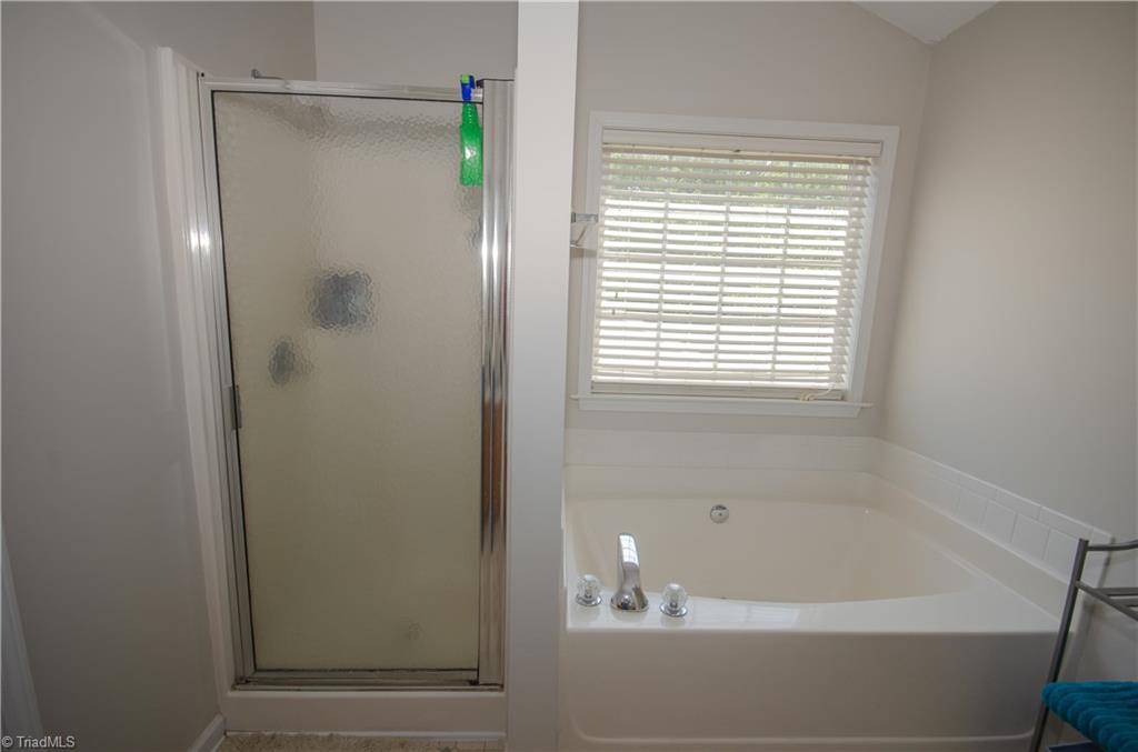 300 Falcon Road Gibsonville, NC 27249 - Photo 20 of 29 Separate Shower and Garden Tub