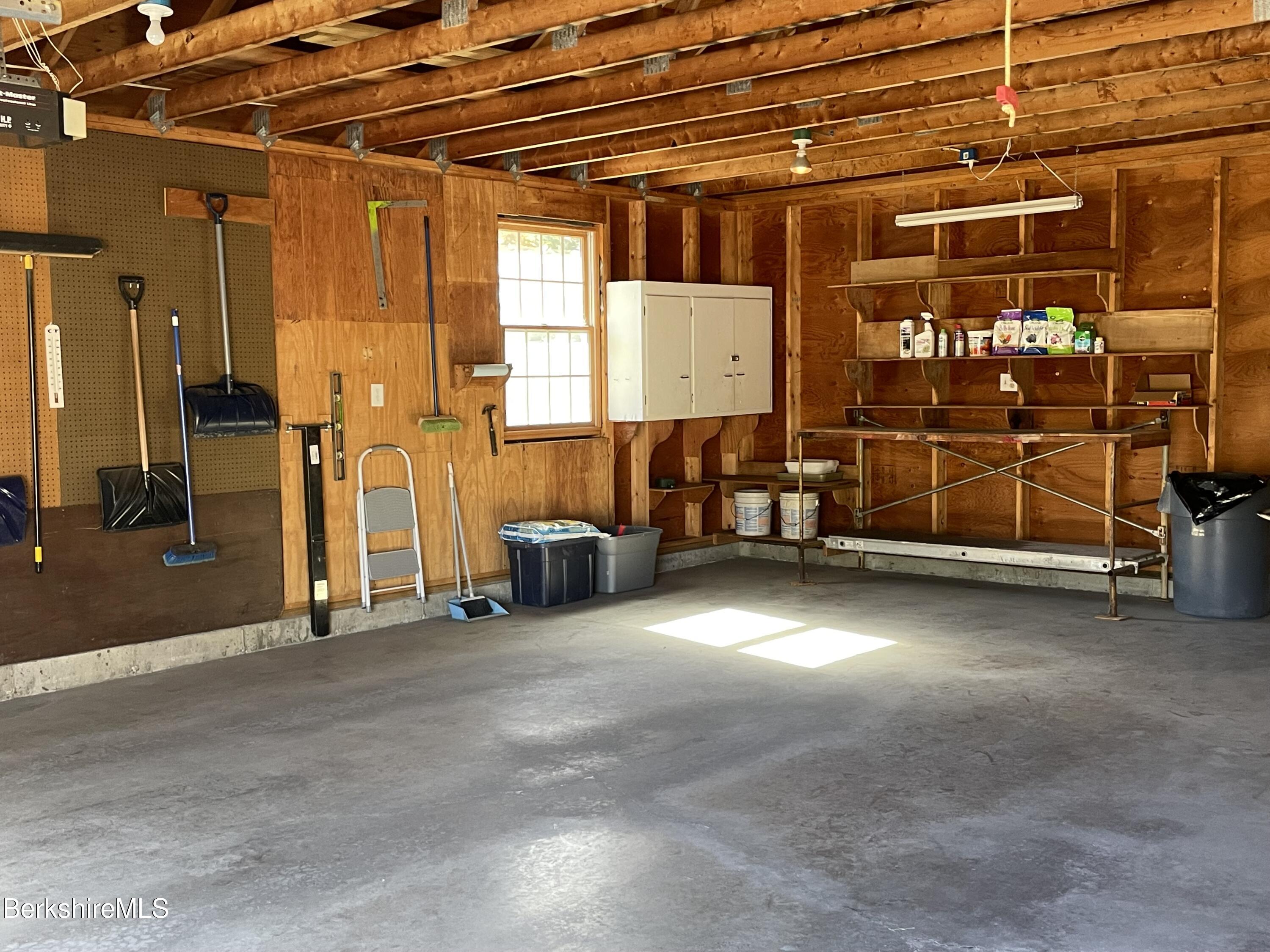 181 Main Road Monterey, MA 01230 - Photo 32 of 63 a view of a room with wooden walls