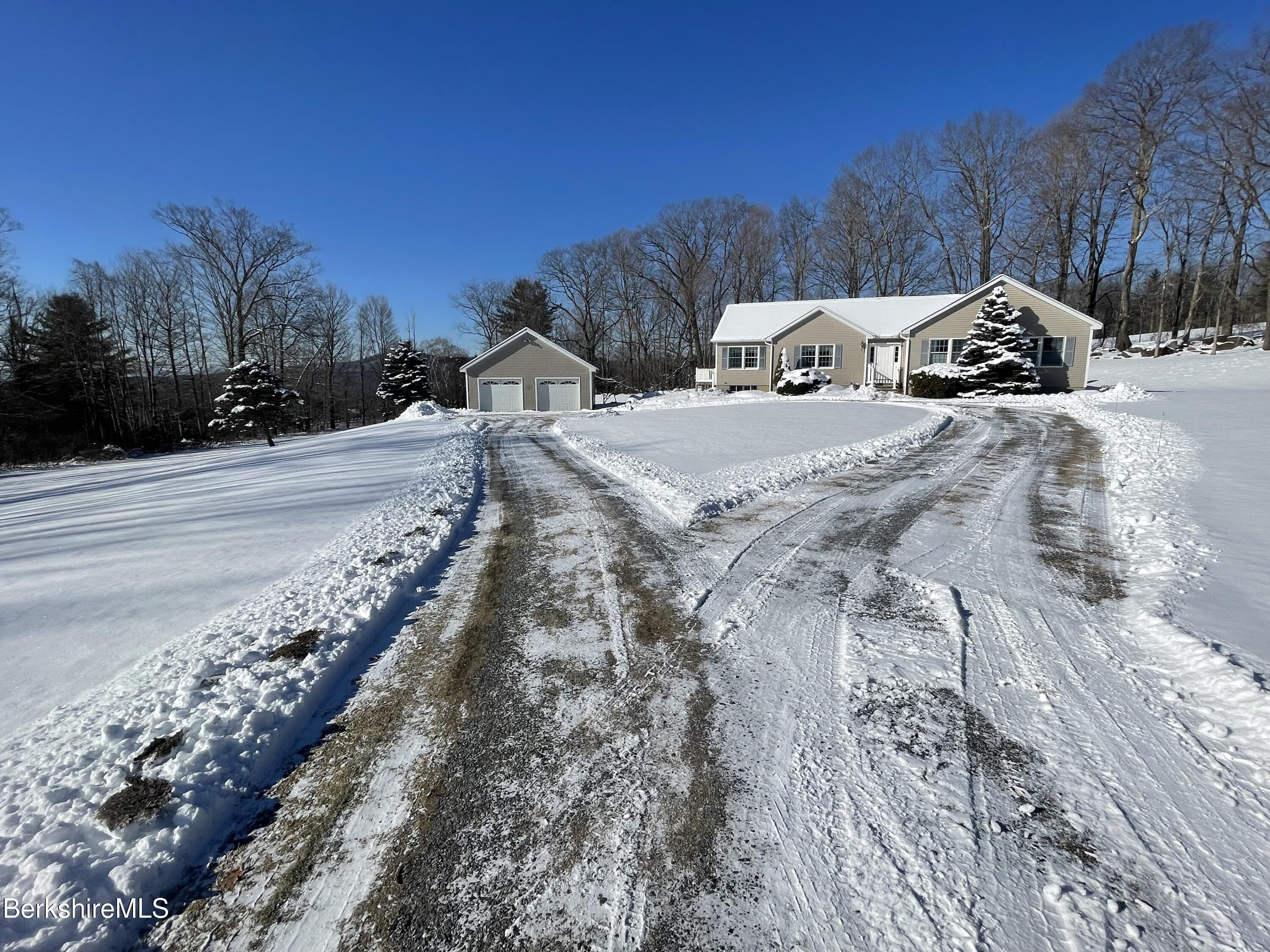 181 Main Road Monterey, MA 01230 - Photo 58 of 63 a view of a backyard of the house