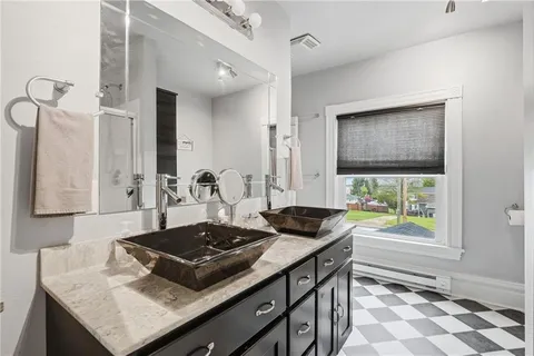 a kitchen with a stove and a sink