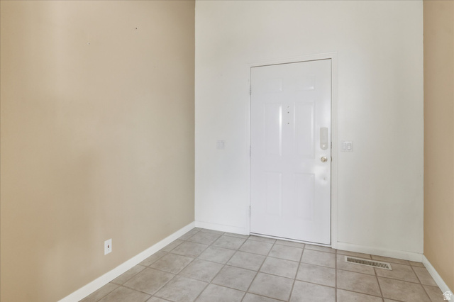 2887 View Crest Circle North Logan, UT 84341 - Photo 22 of 37 Entrance foyer with light tile patterned floors and baseboards