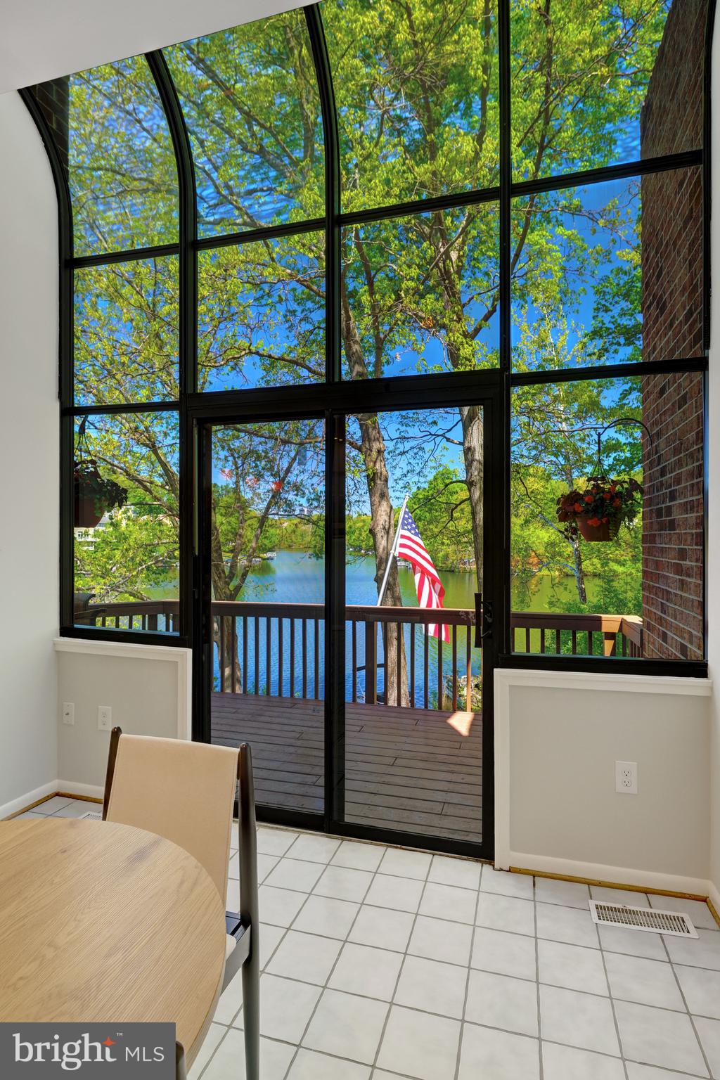 11024 Thrush Ridge Road Reston, VA 20191 - Photo 19 of 63 Beautiful lake views in the dining area & kitchen.
