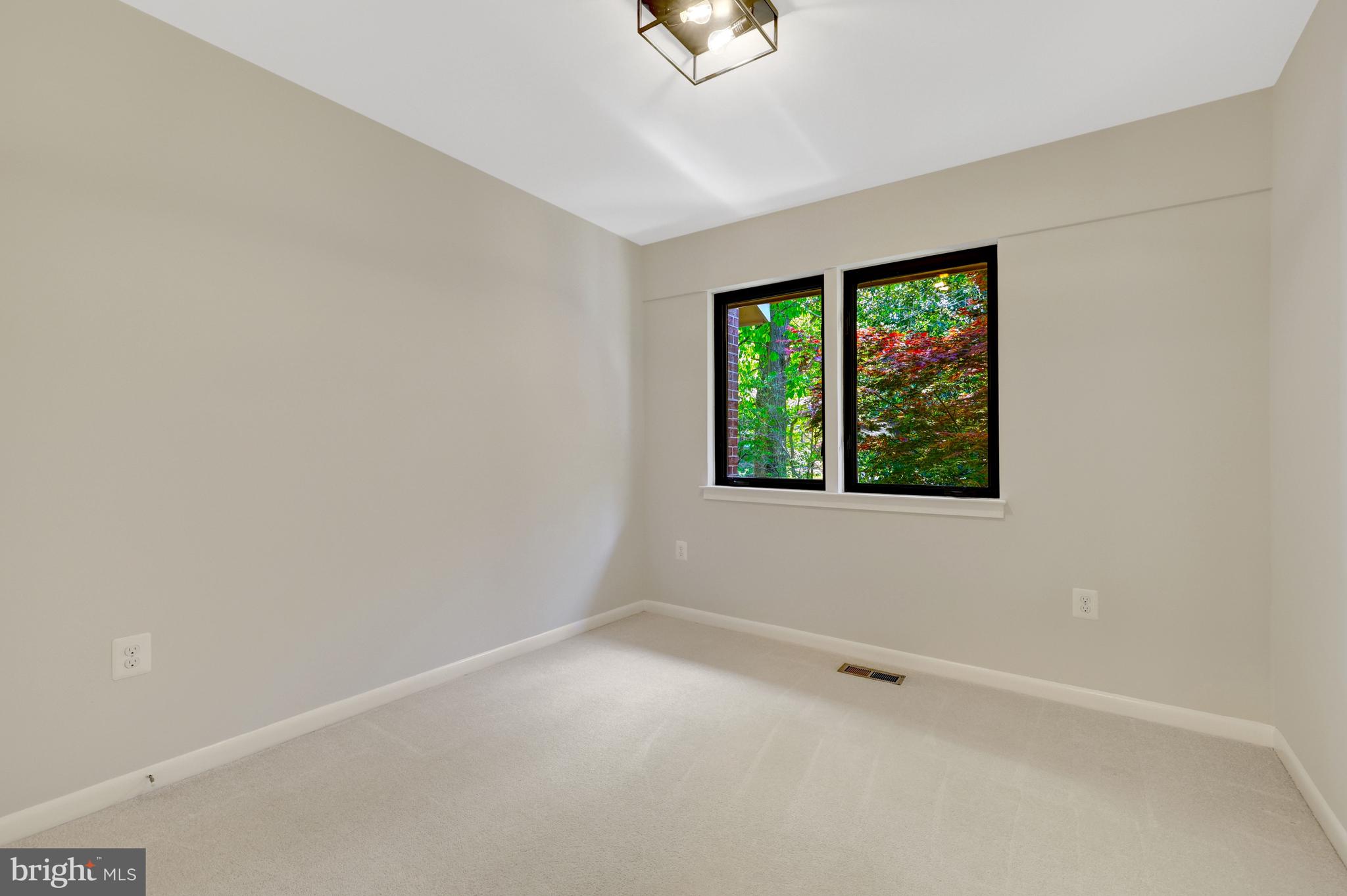 11024 Thrush Ridge Road Reston, VA 20191 - Photo 34 of 63 Bedroom #3 has two windows with views of the trees