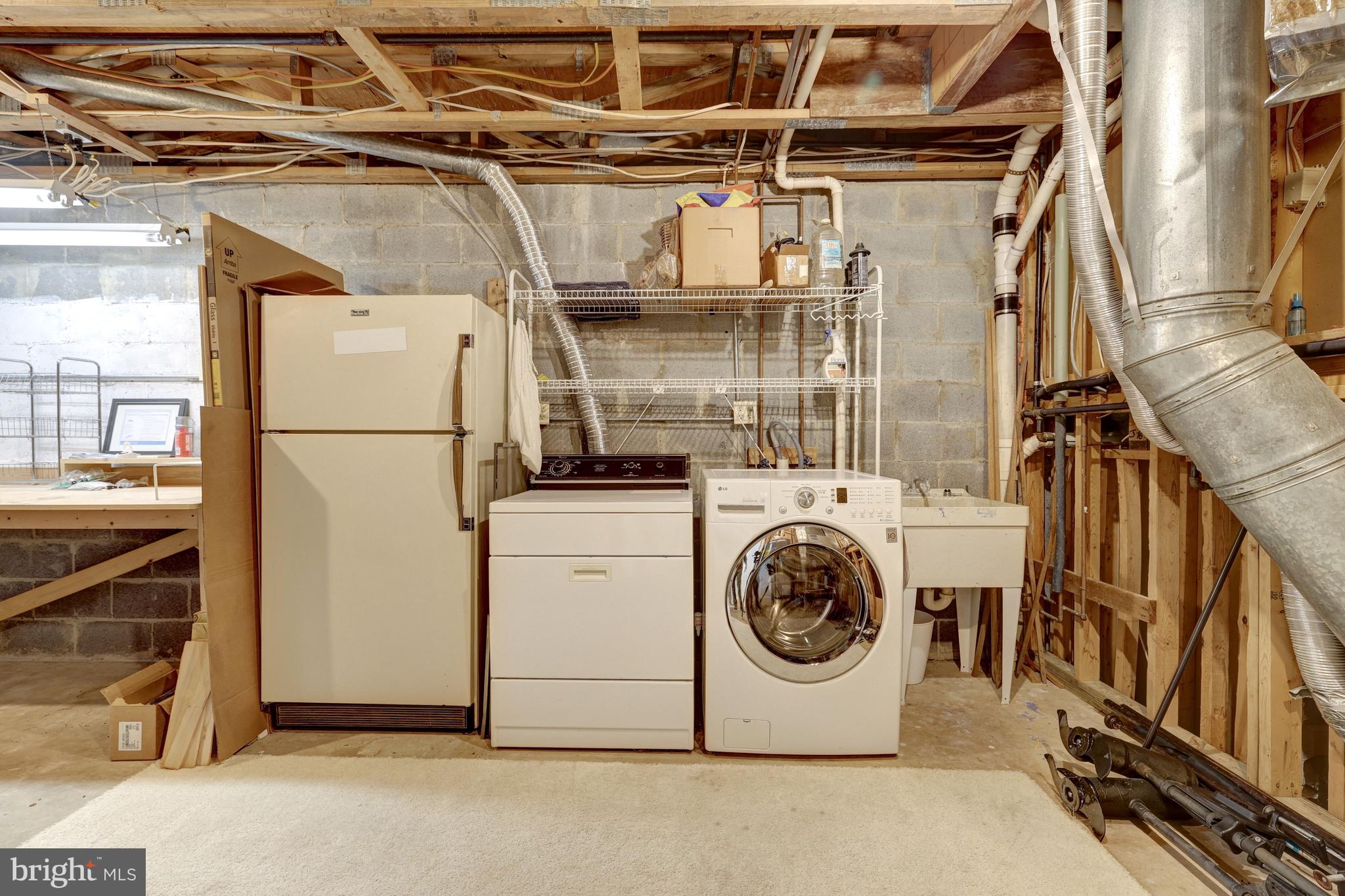 11024 Thrush Ridge Road Reston, VA 20191 - Photo 42 of 63 Unfinished storage room has the 2nd washer & dryer