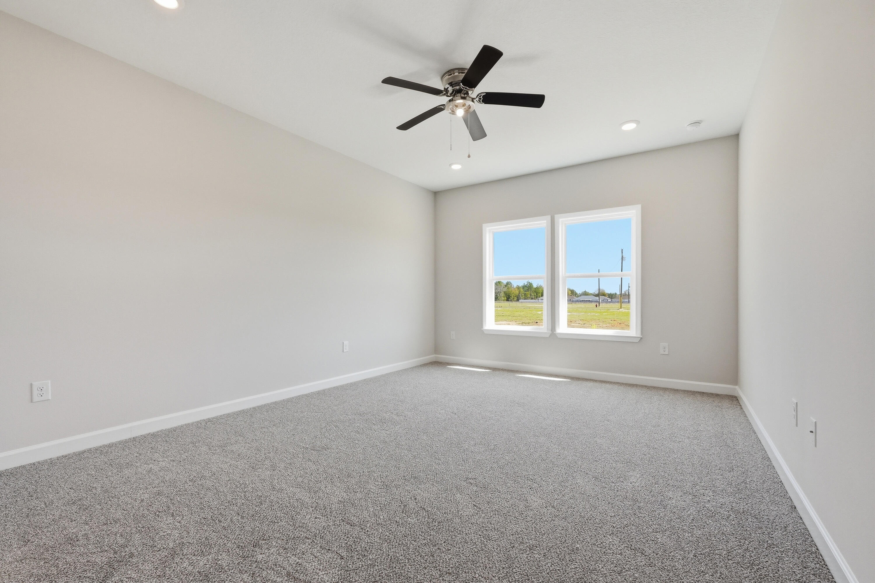 6114 Mildreds Way Crestview, FL 32539 - Photo 14 of 24 a view of an empty room with a window