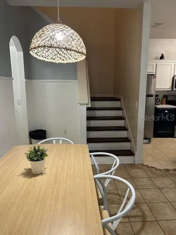 a view of a kitchen area and microwave