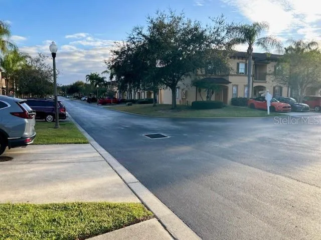 a view of a street with houses