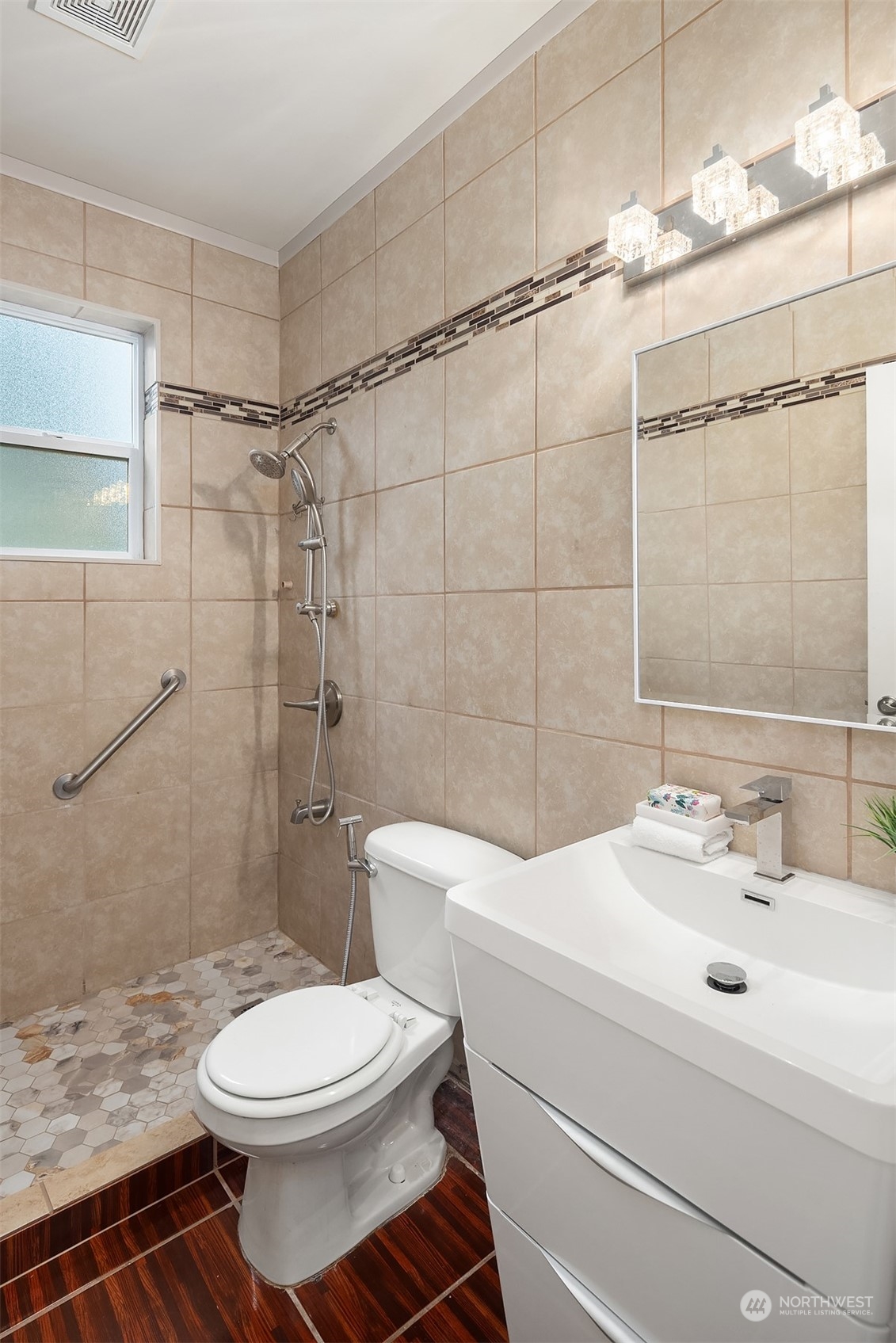 5004 Northeast 25th Street Renton, WA 98059 - Photo 22 of 37 a bathroom with a sink toilet and shower