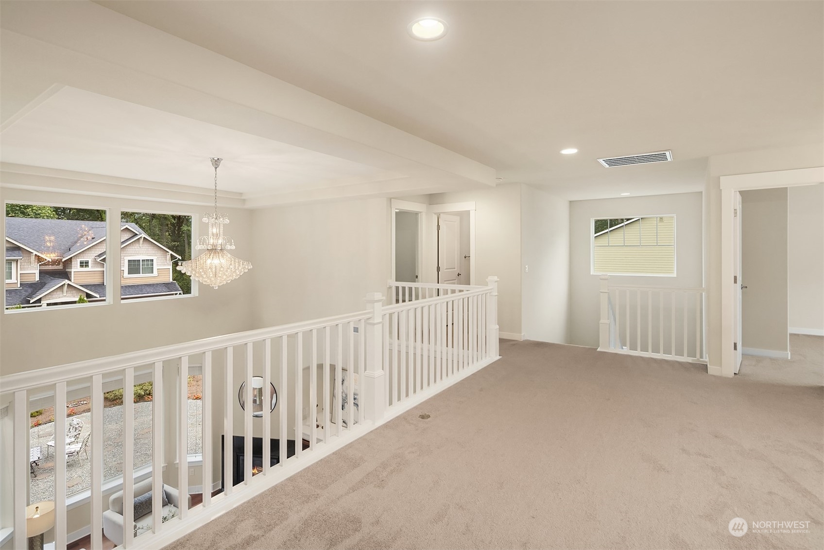 5004 Northeast 25th Street Renton, WA 98059 - Photo 25 of 37 a view of a hallway with windows