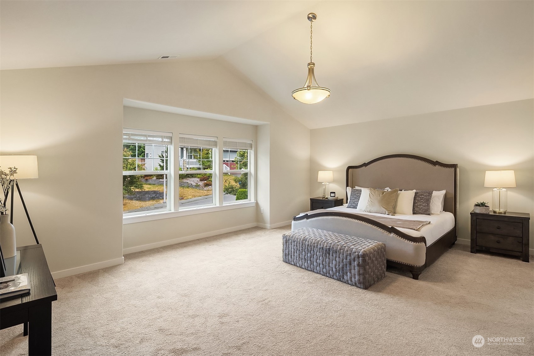 5004 Northeast 25th Street Renton, WA 98059 - Photo 27 of 37 a bedroom with a bed window and a mirror