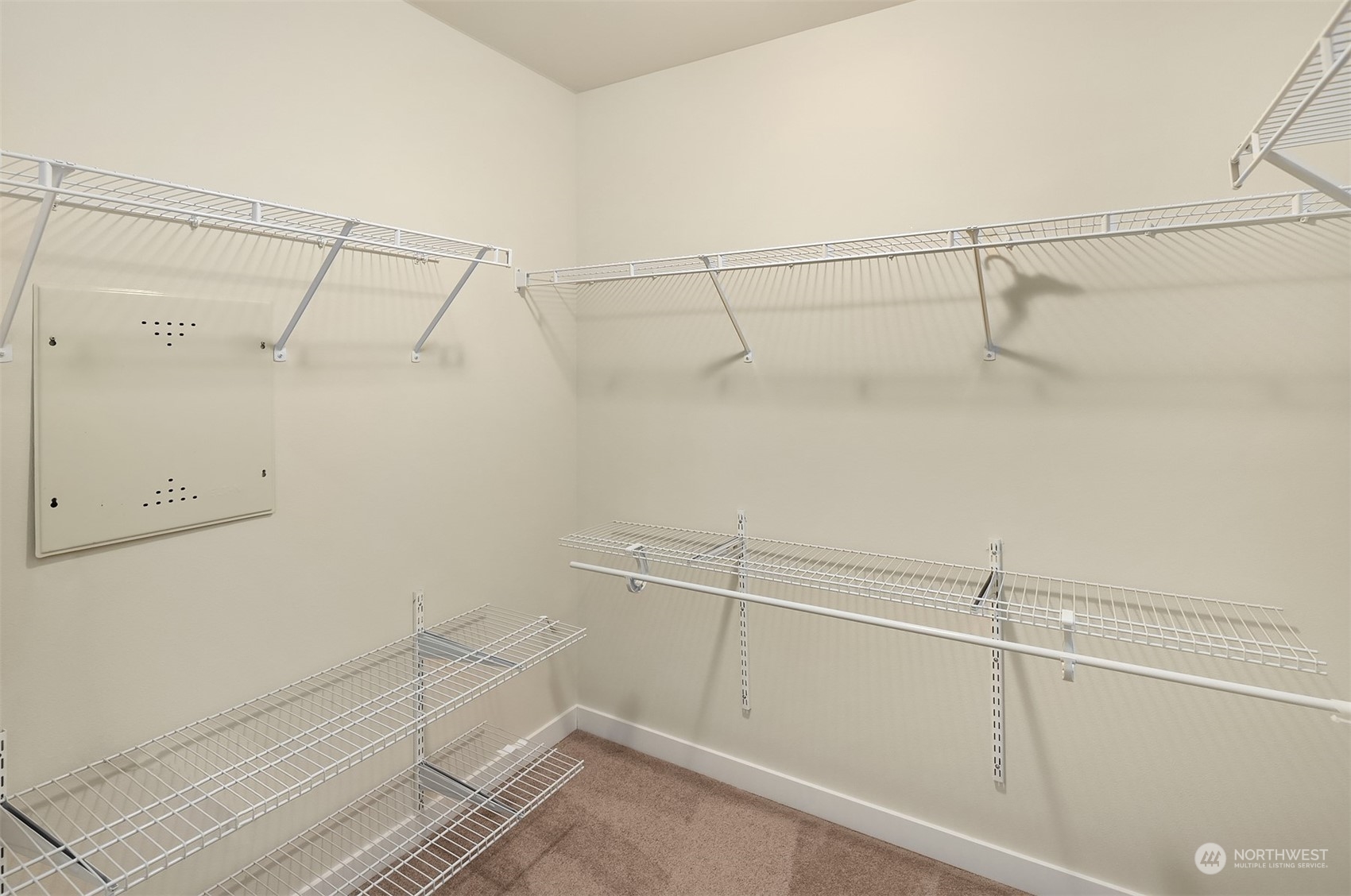 5004 Northeast 25th Street Renton, WA 98059 - Photo 31 of 37 a view of a room with racks on the wall