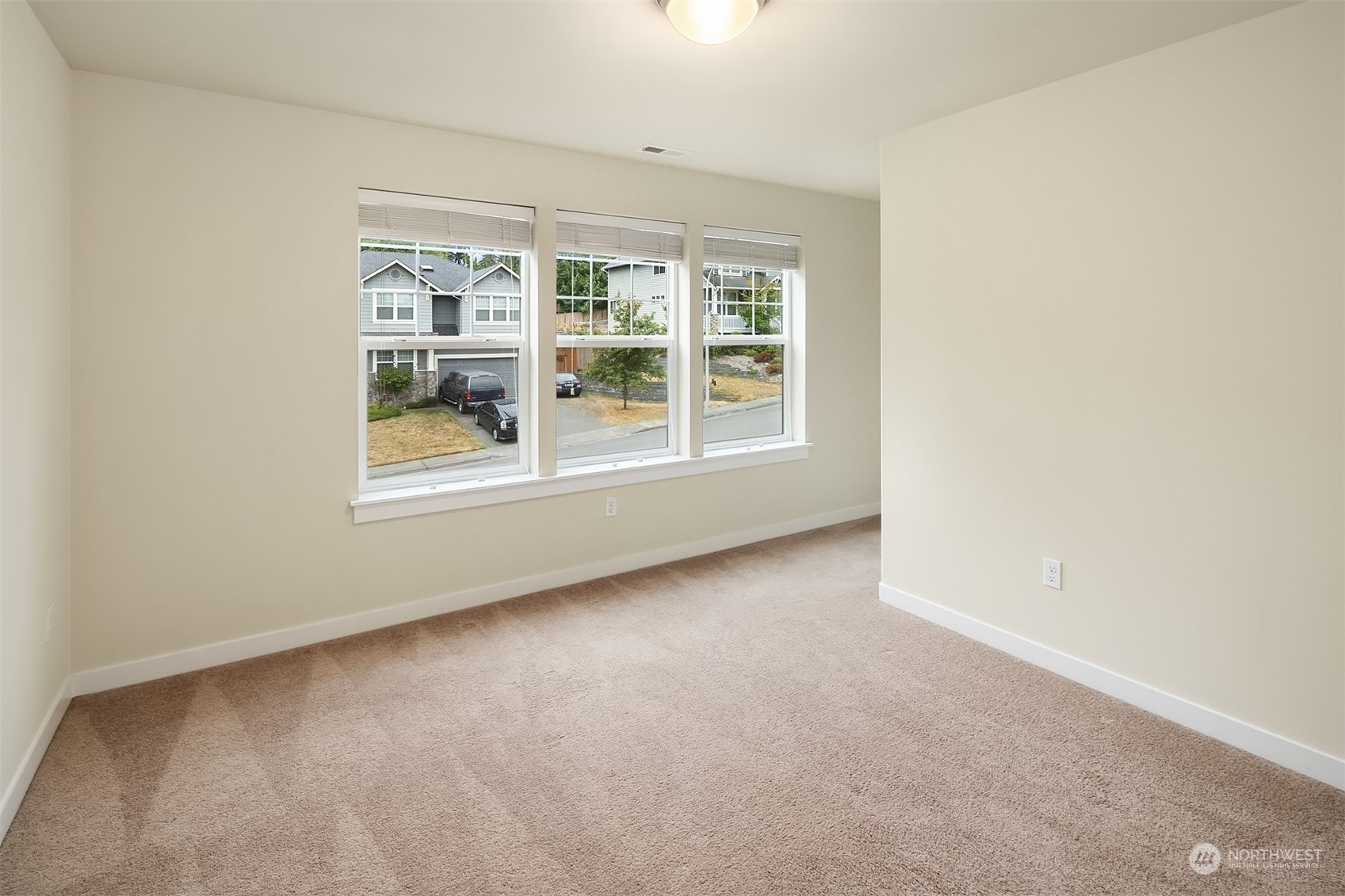 5004 Northeast 25th Street Renton, WA 98059 - Photo 33 of 37 an empty room with a window