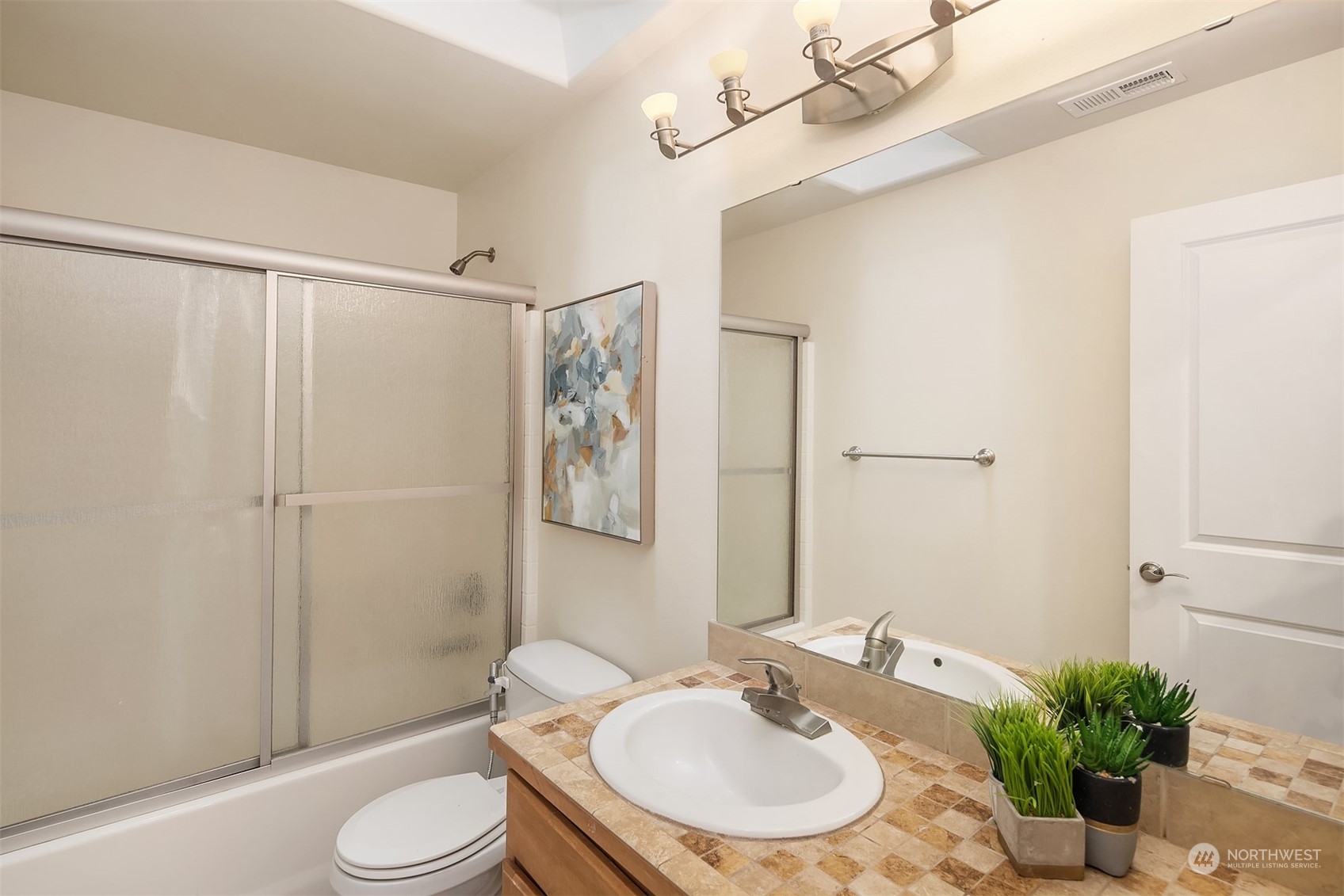 5004 Northeast 25th Street Renton, WA 98059 - Photo 34 of 37 a bathroom with a sink toilet and shower