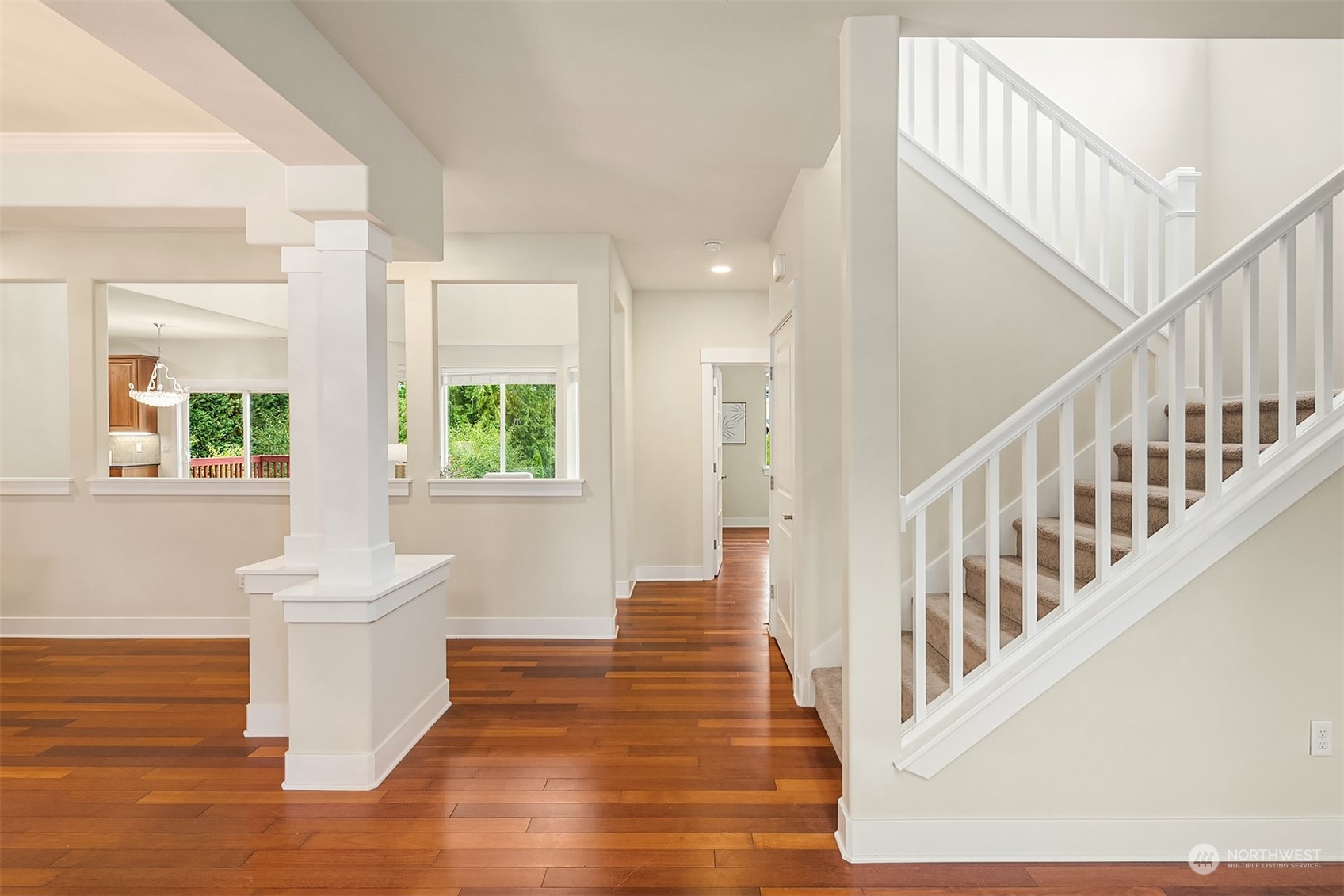 5004 Northeast 25th Street Renton, WA 98059 - Photo 6 of 37 a view of an entryway with wooden floor and windows
