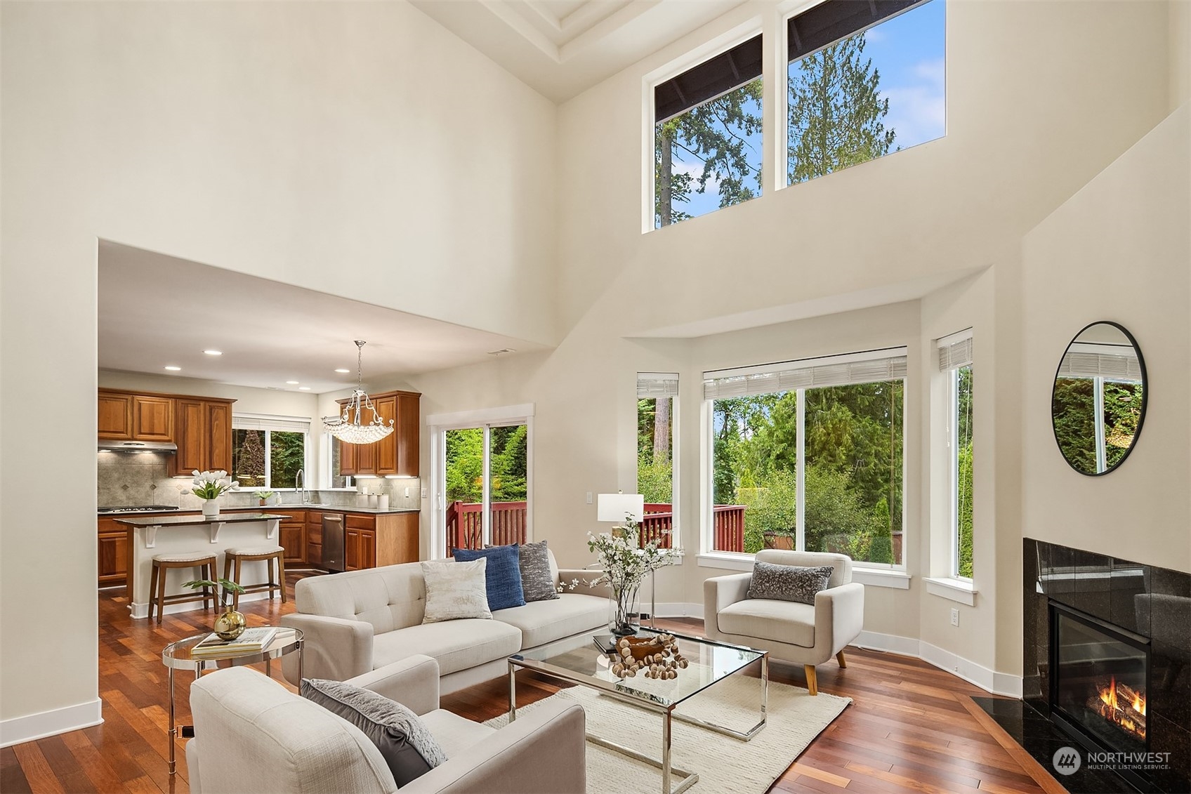 5004 Northeast 25th Street Renton, WA 98059 - Photo 8 of 37 a living room with furniture and a fireplace