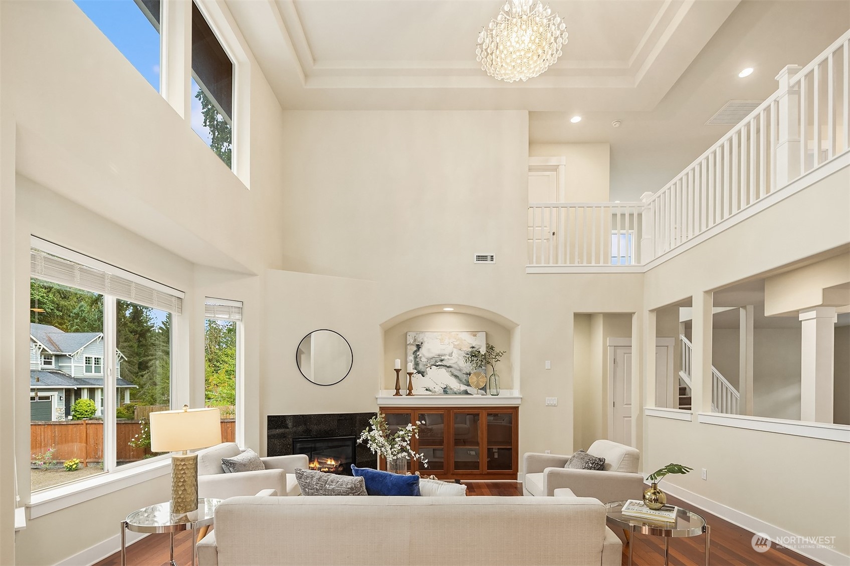 5004 Northeast 25th Street Renton, WA 98059 - Photo 10 of 37 a living room with fireplace furniture and a large window