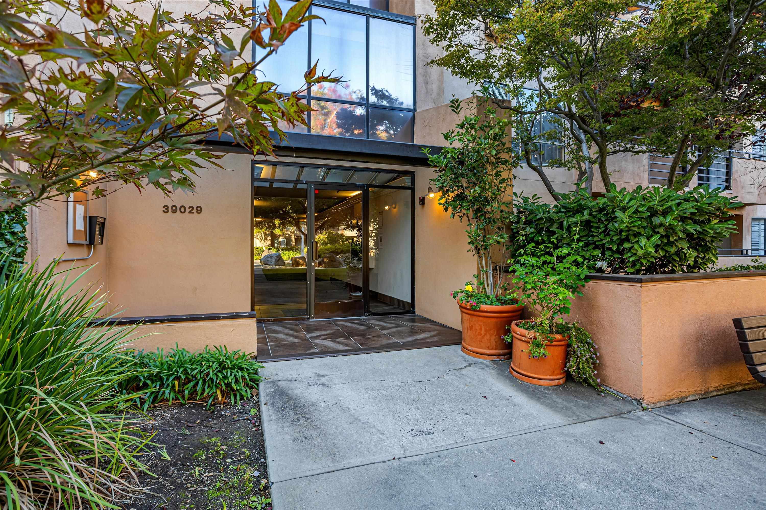 39059 Guardino Drive, Unit 206 Fremont, CA 94538 - Photo 2 of 37 a view of outdoor space and patio