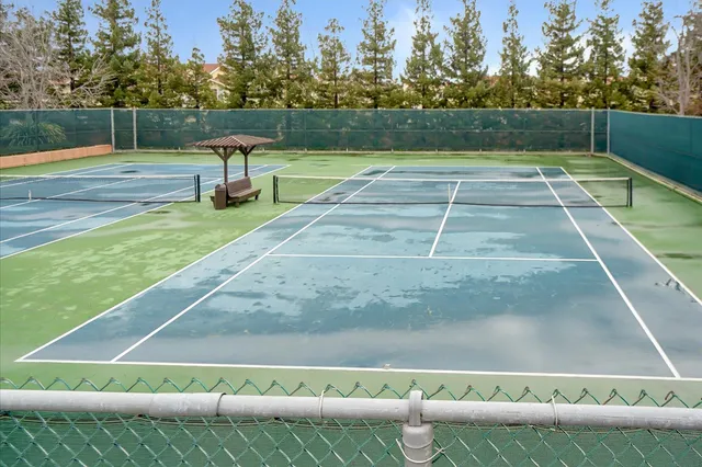 a view of a building with a yard