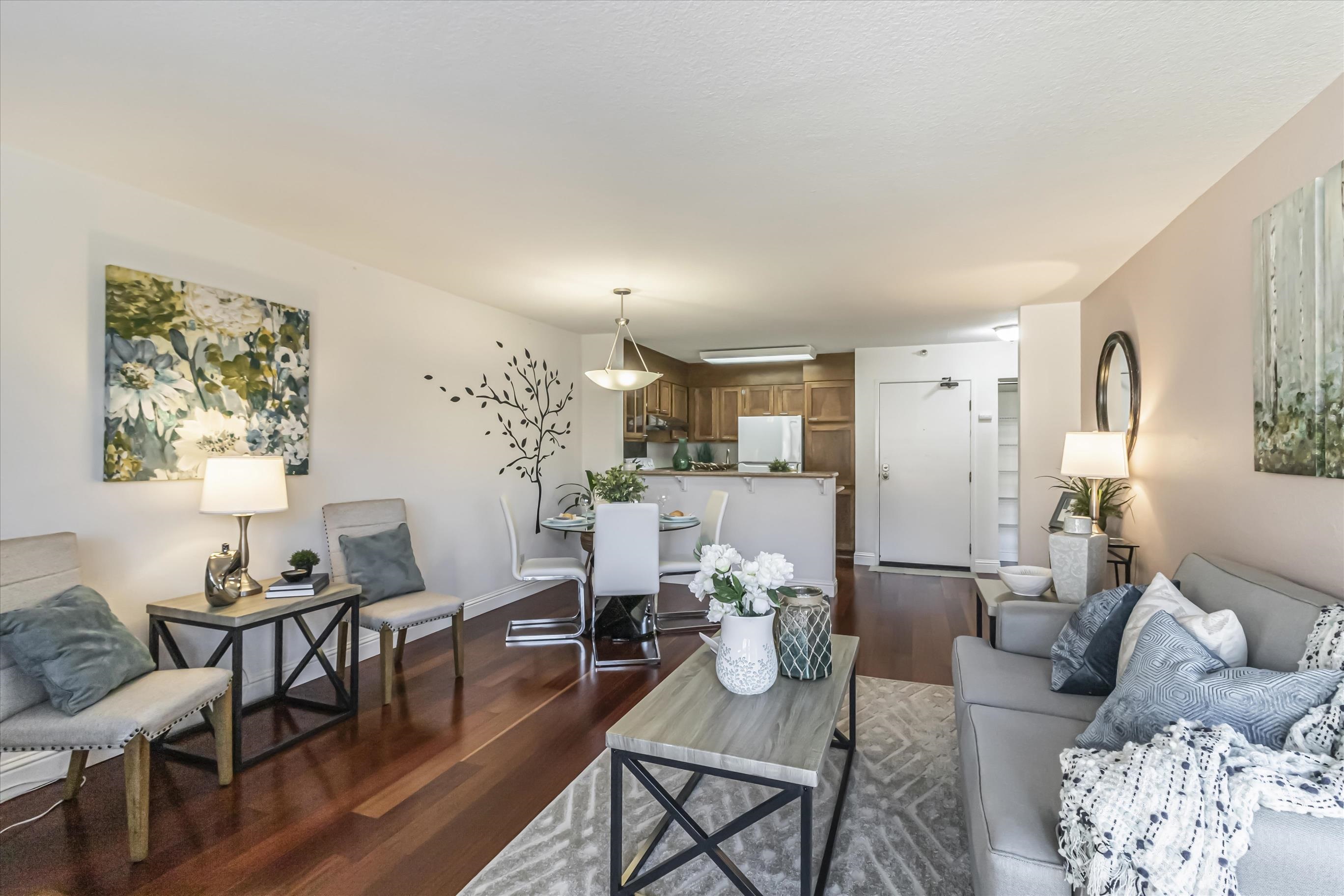 39059 Guardino Drive, Unit 206 Fremont, CA 94538 - Photo 10 of 37 a living room with furniture and wooden floor