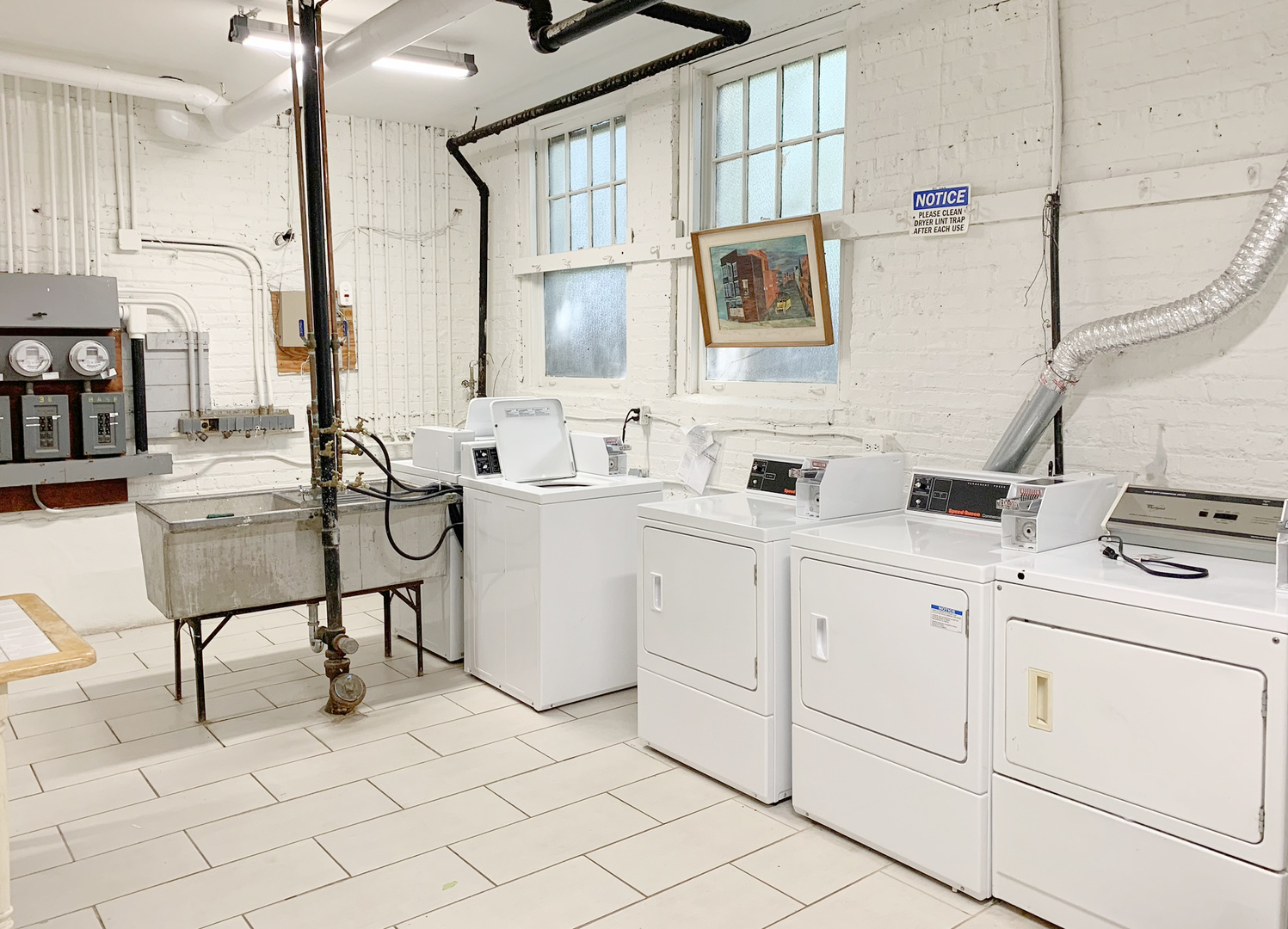 803 Case Street, Unit 3 Evanston, IL 60202 - Photo 10 of 12 a kitchen with cabinets and chairs