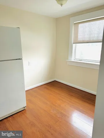 a kitchen with a sink and a microwave