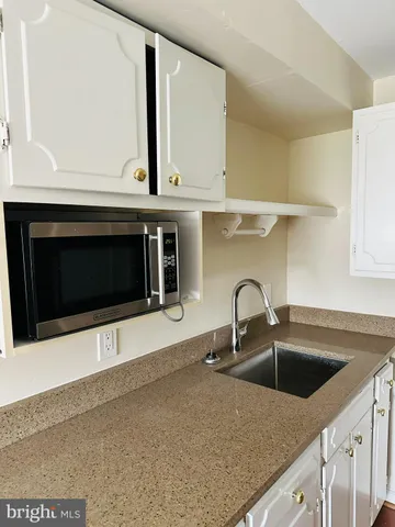 a utility room with washer and dryer