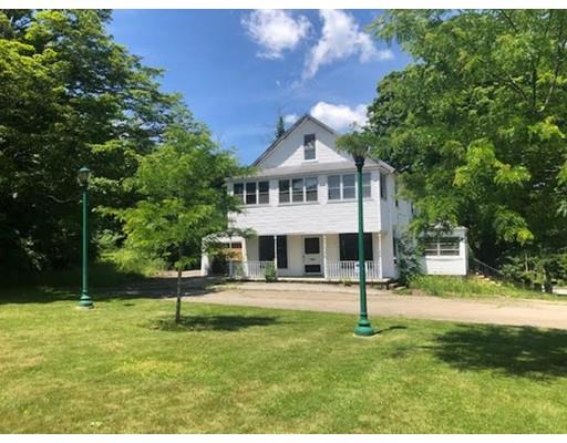 21 Coldbrook Road Oakham, MA 01068 - Photo 6 of 11 a front view of a house with a yard