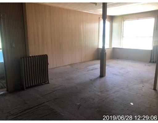 21 Coldbrook Road Oakham, MA 01068 - Photo 8 of 11 wooden floor in an empty room with a window