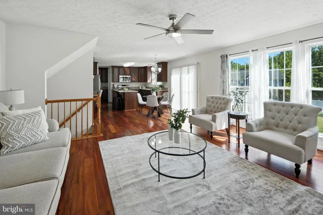 a view of a room with a large window