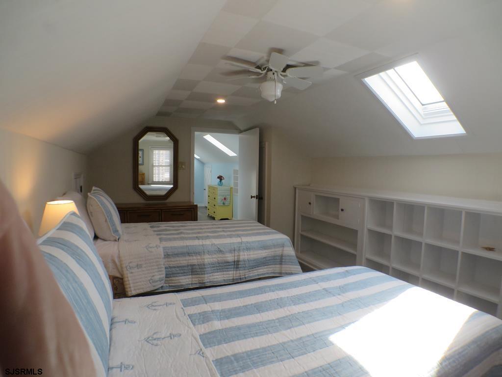 814 Wesley Road Ocean City, NJ 08226 - Photo 28 of 29 a bedroom with a bed and window