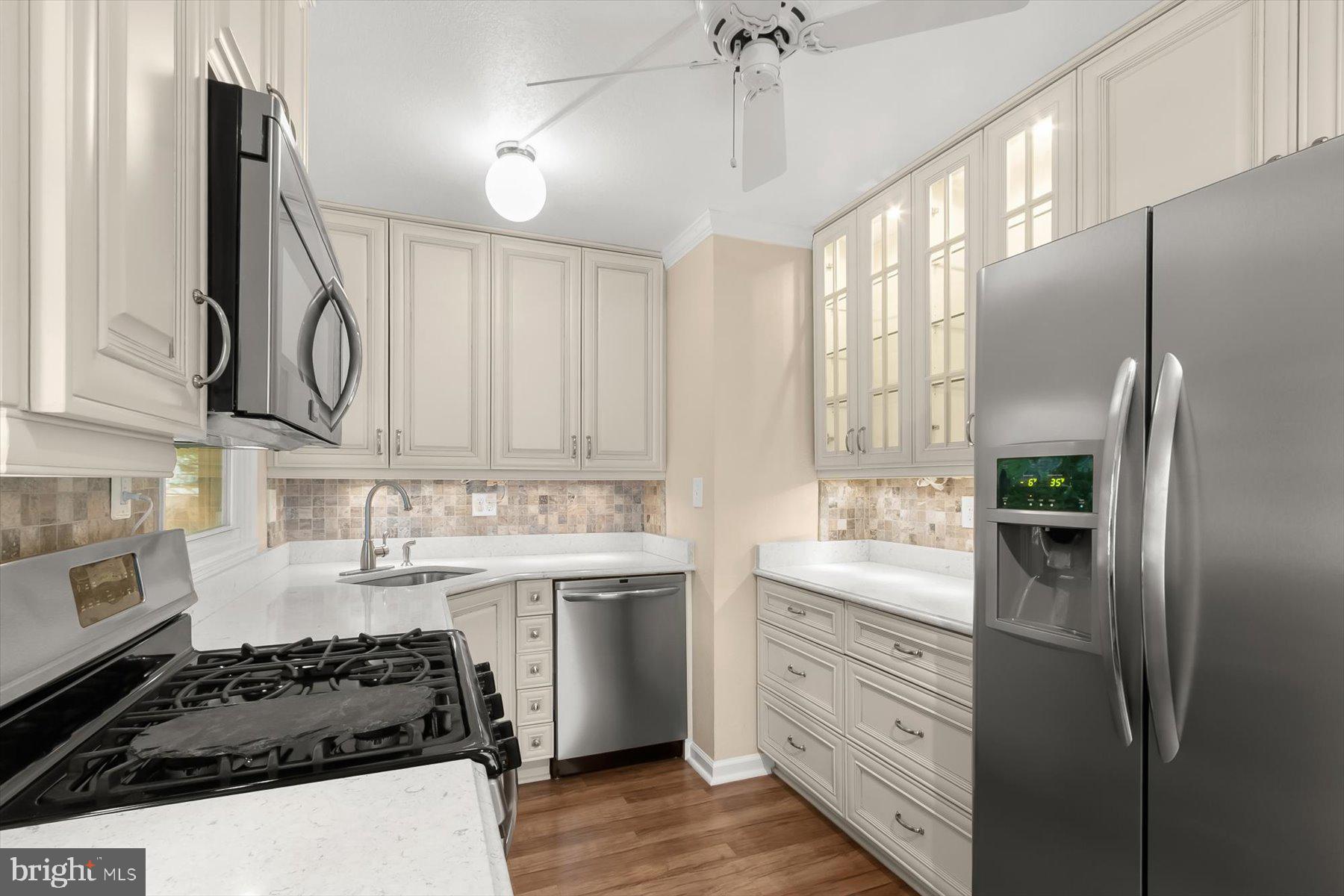 3105 Fayette Road Kensington, MD 20895 - Photo 17 of 93 a kitchen with a sink stove and refrigerator
