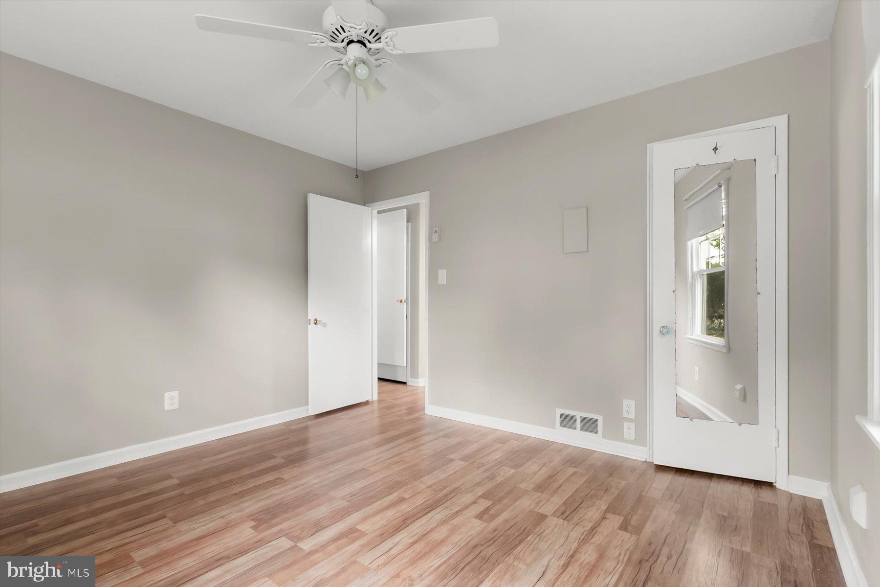3105 Fayette Road Kensington, MD 20895 - Photo 29 of 93 a view of an empty room with wooden floor